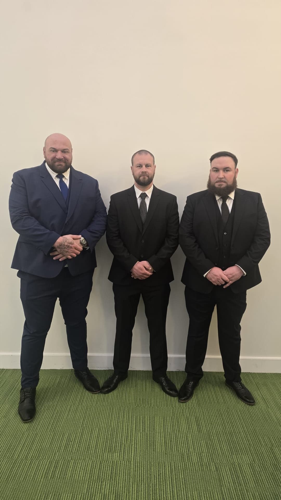 Suited Elite Security close protection officers